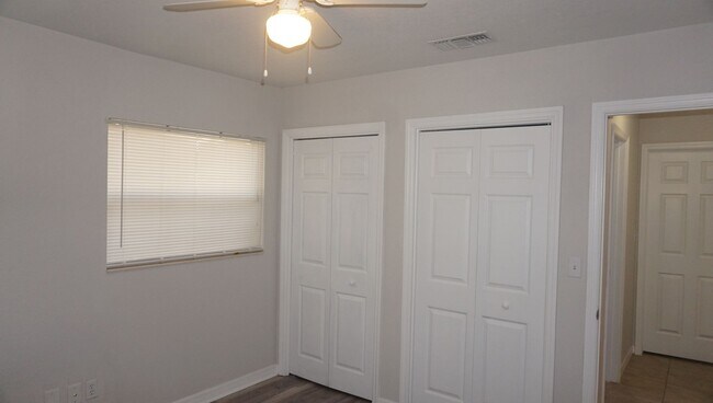 Building Photo - Four Bed - Three Bath - Large Storage Area...