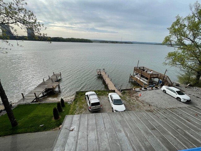 view of lake and dock from bedroom balcony - 6006 Lynn Rd