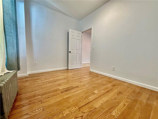 Building Photo - 8689 15th Ave