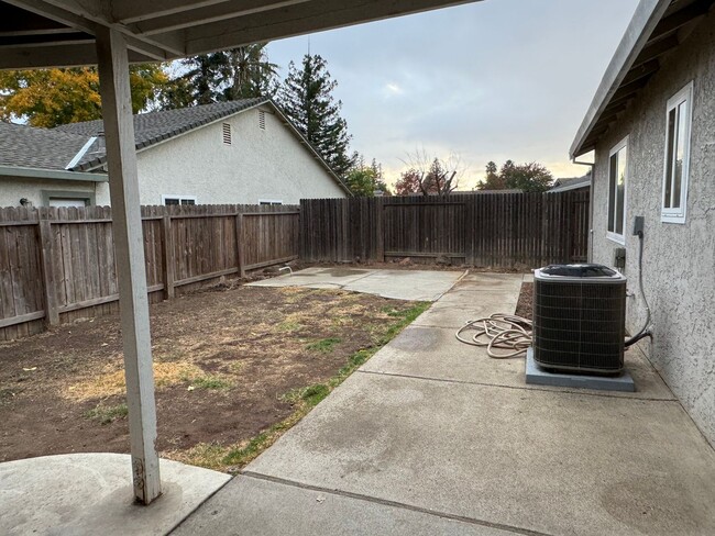 Building Photo - Corner lot with new paint & landscaper