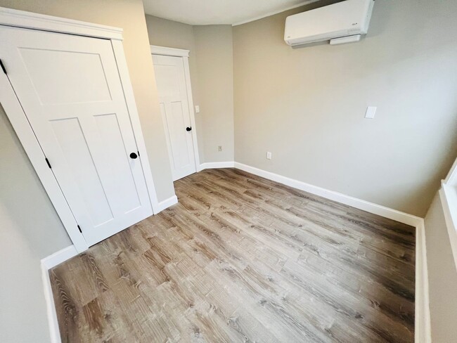 Building Photo - NEWLY RENOVATED PENTHOUSE UNIT WITH PARKIN...