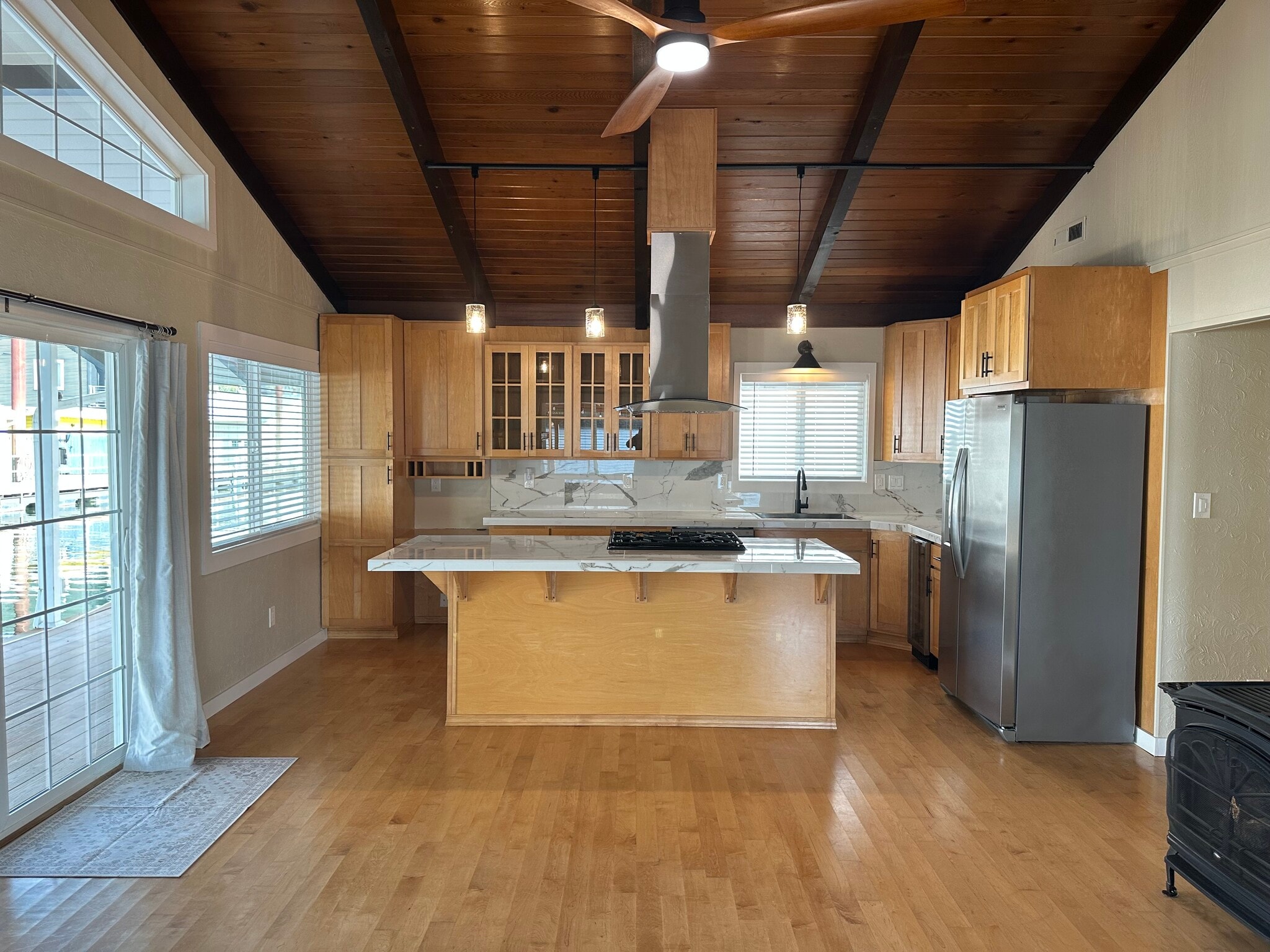 The kitchen and living room form one huge room with views of the water. - 1879 N Jantzen Ave