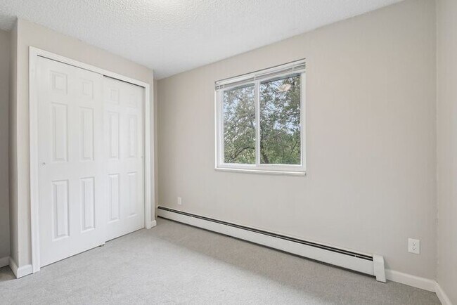 Building Photo - Townhome-Style Living with Greenbelt Views, Attached Garage & Community Pool!