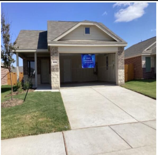 front view- 2 car garage - 15136 Tejano St