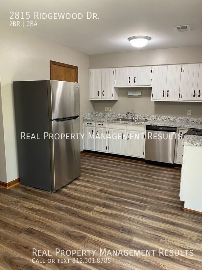 Building Photo - 2 Bedroom, 1.5 Bath Duplex, Northside Evan...