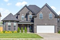 Building Photo - Pet Friendly Four Bedroom with Bonus!