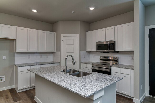 Building Photo - GORGEOUS 2 BEDROOM FOUR PLEX LOCATED IN MI...
