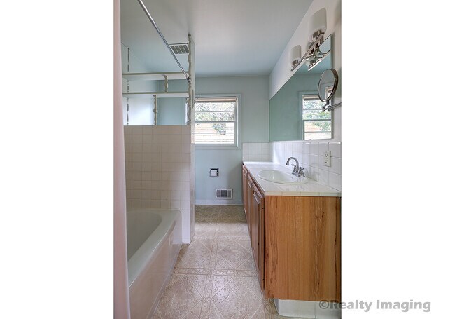 Building Photo - 7017 N Mobile Ave