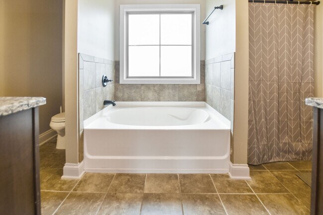 Building Photo - Pet Friendly Four Bedroom with Basement in...