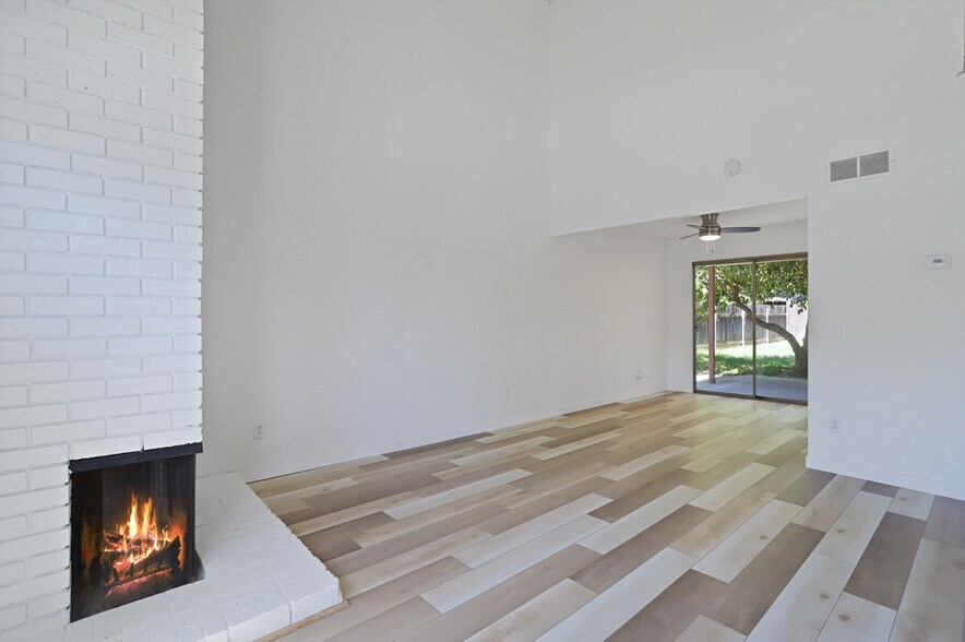 Family Room Open to Dining Room - 1305 Sylvan Meadows Dr