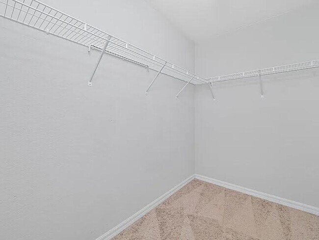 Building Photo - Spacious Three-Bedroom Home with Open Floor Plan, Large Yard & Screened Patio