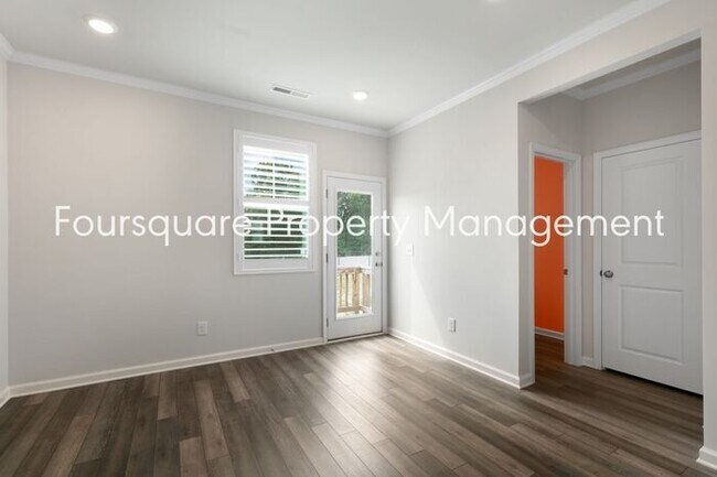 Building Photo - Stylish 3-Level Townhome with Bonus Suite, Deck & Garage – Near I-540 and Shopping