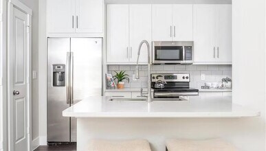 Building Photo - Spacious. Modern. Limited-Time $500 Off. T...