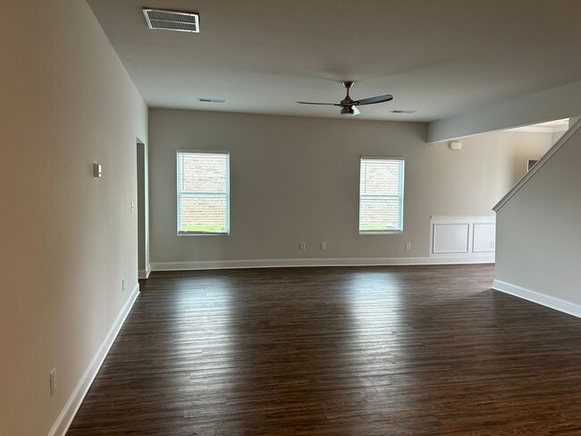 Primary Photo - Three car garage Two story home close to e...