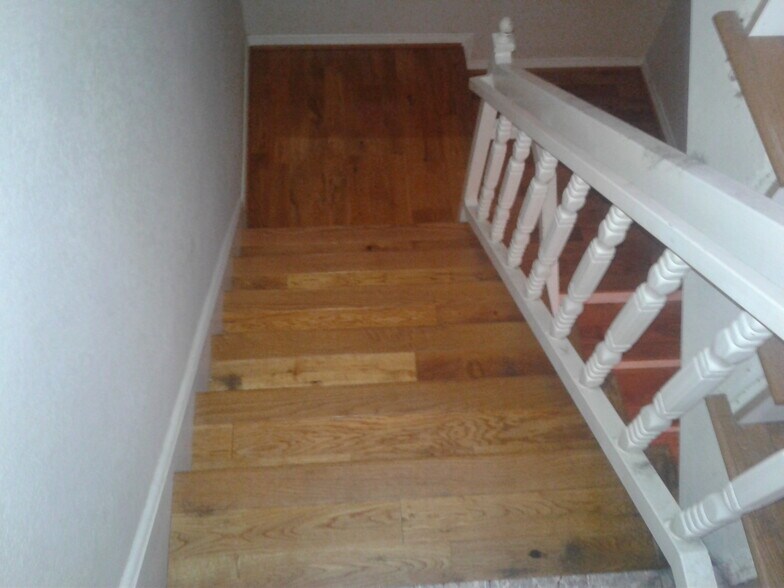 STAIRWAY:NEW HARDWOOD FLOORS-MAIN LEVEL TO LOWER LEVEL - 2106 Clark Ln