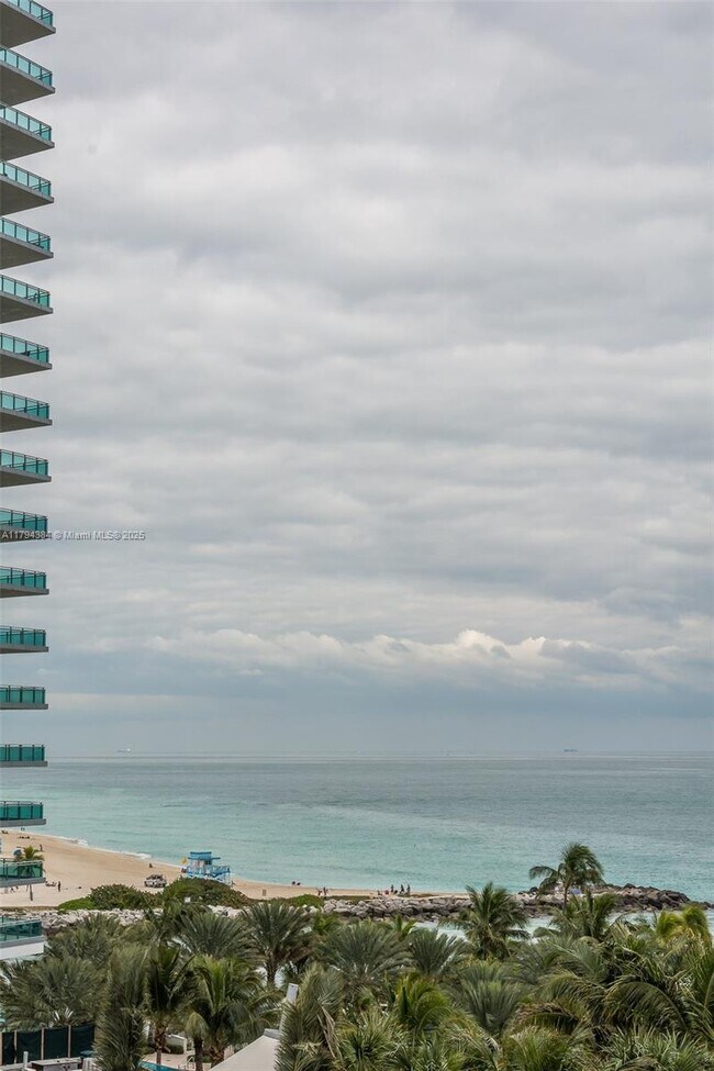 Building Photo - 10275 Collins Ave