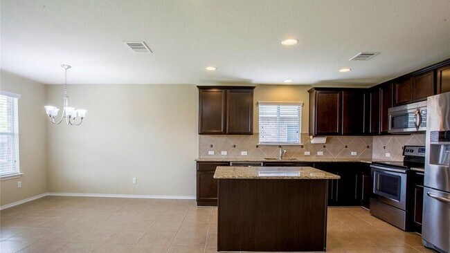 Building Photo - 5716 Hopkins Dr