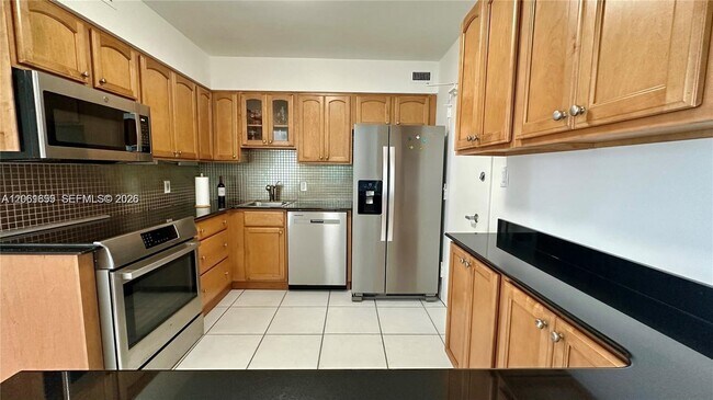 Building Photo - 5161 Collins Ave