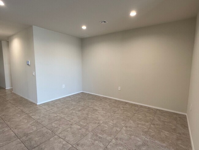 Building Photo - Large Newer-Built 4 Bedroom 2 Bathroom 3 Car Garage Home in Coolidge!