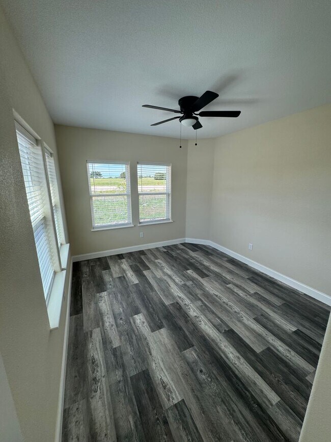 Building Photo - COMING SOON.....Modern Townhome with private fenced yard! HIGH CEILINGS PETS WELCOME
