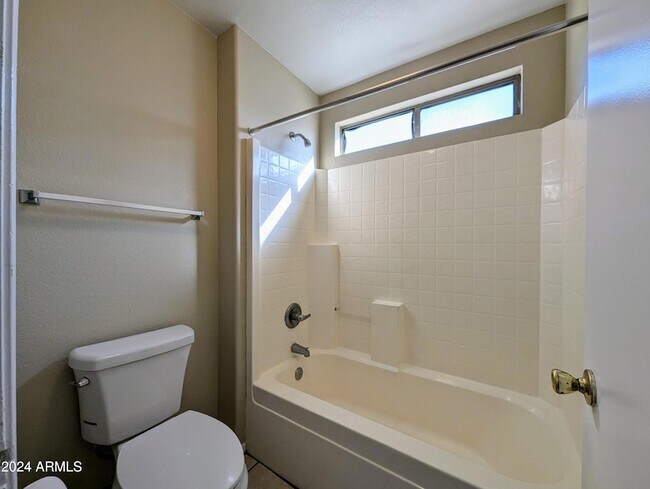 Building Photo - 7059 W Gardenia Ave