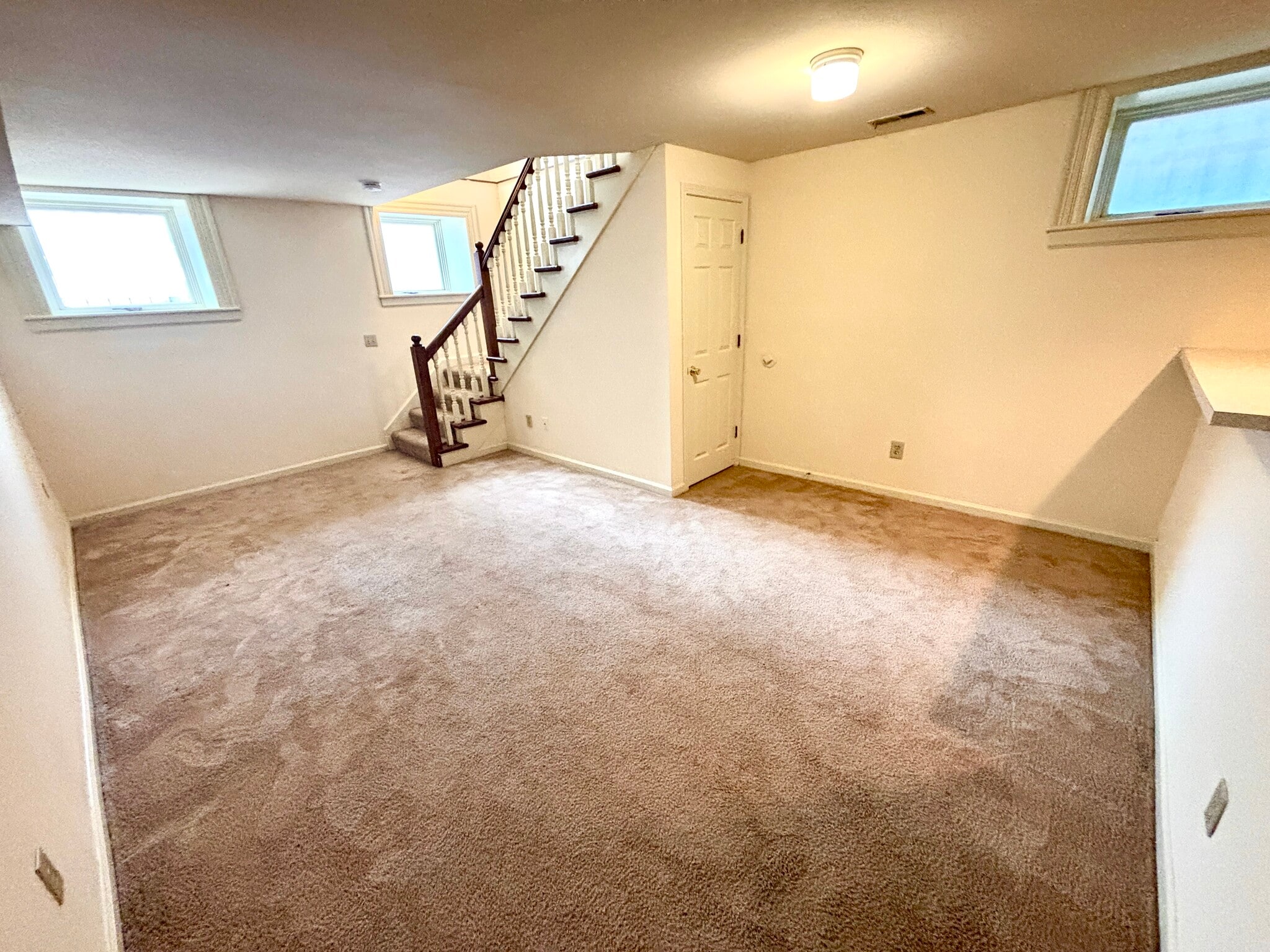 Living Room space with closet under stairs - 2325 S 10th St
