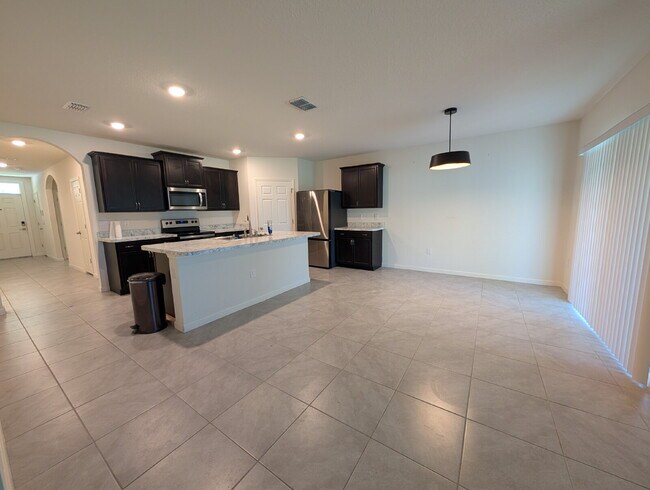 Building Photo - Modern 4-Bedroom Home with Large Backyard in Quiet SW Palm Bay – Available Mid-June