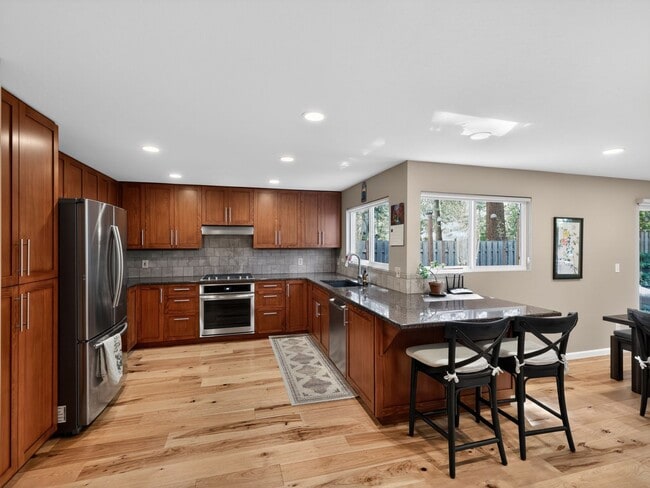 Building Photo - Fully Remodeled Single-Level in Four Seasons — Central A/C, Dual-Pane Windows, Engineered Hardwoo...