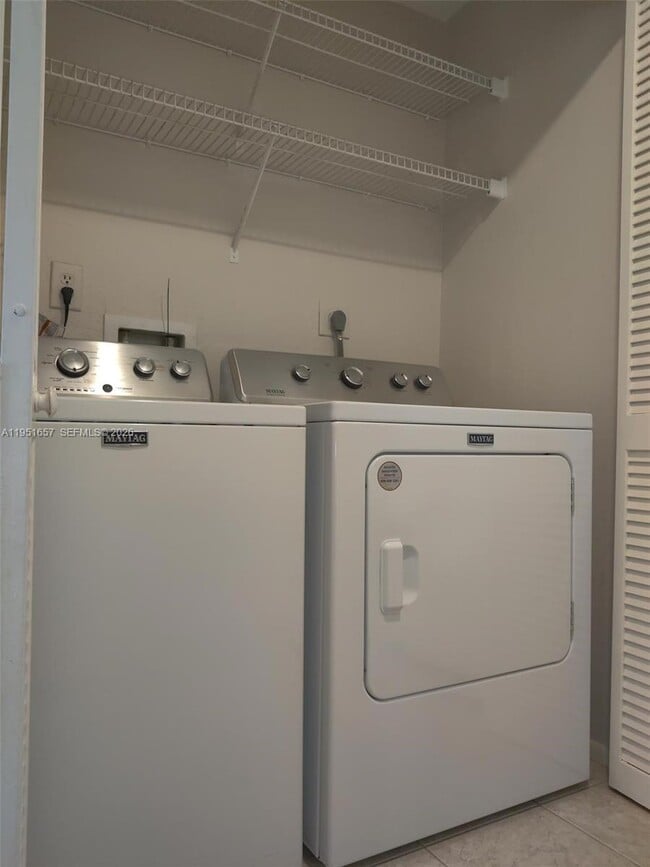 Building Photo - 1865 Palm Cove Blvd