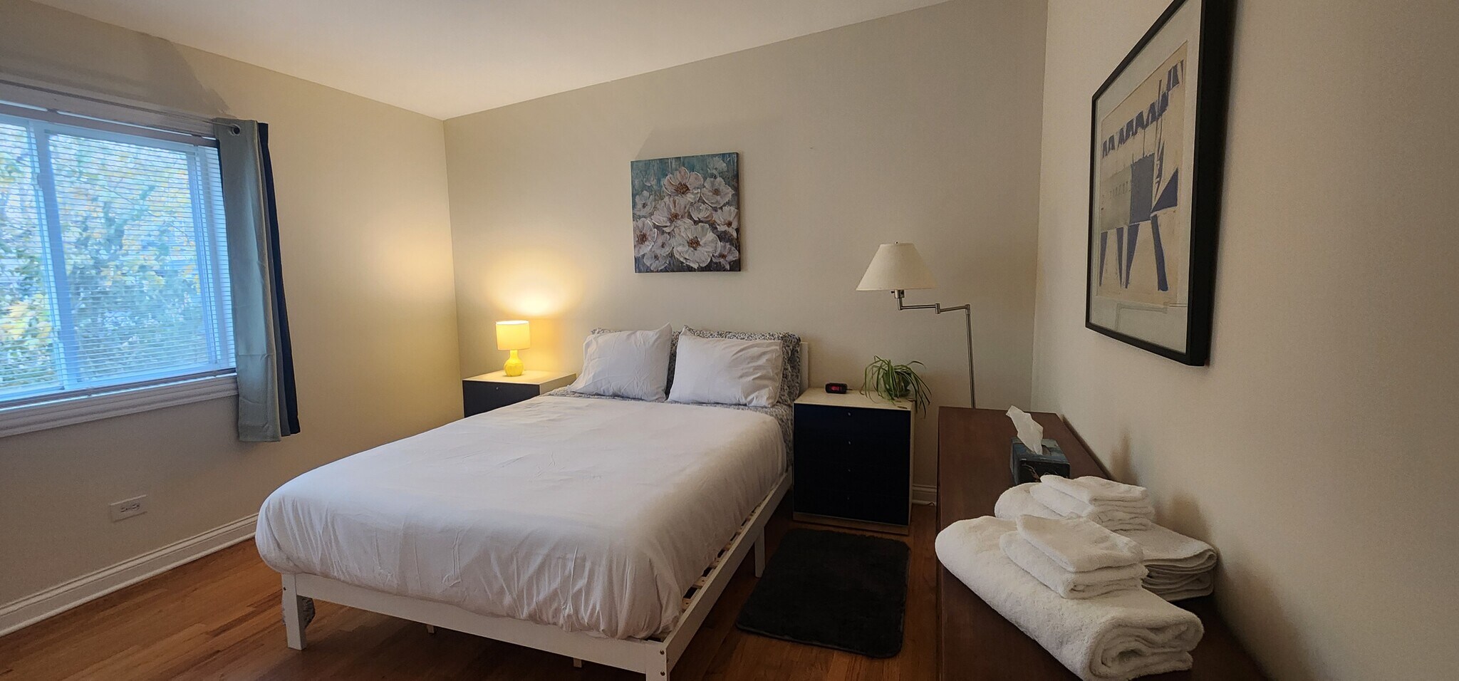 Master Bedroom includes queen bed, two nightstands, two lamps, a dresser and two closets - 2018 Lake St
