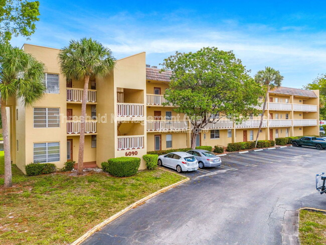 Building Photo - 6090 NW 64th Ave