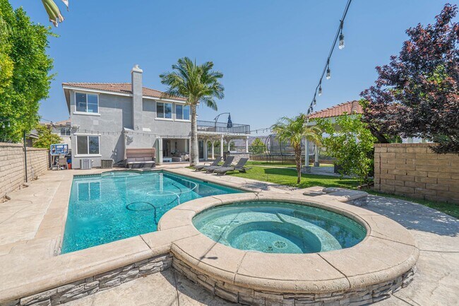 Building Photo - Spectacular 5-Bedroom Home with Pool, RV P...