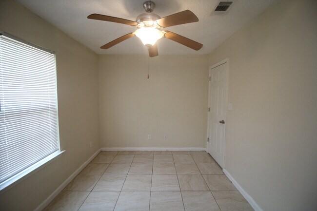 Building Photo - West Pensacola Duplex Living — 3BR Home with Open Floor Plan, Eat-In Kitchen, Covered Patio & Low...