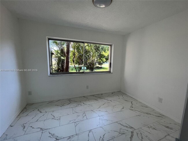Building Photo - 6520 NW 98th Terrace