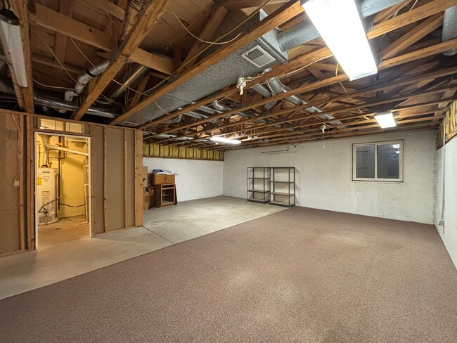 Building Photo - Large 3 bedroom, 2.5 bath townhome with 2-car garage!