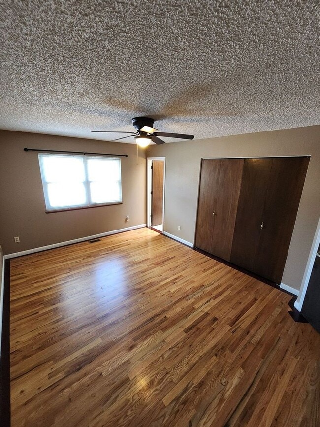 Building Photo - Spacious 4-Bedroom Home with RV Parking in...