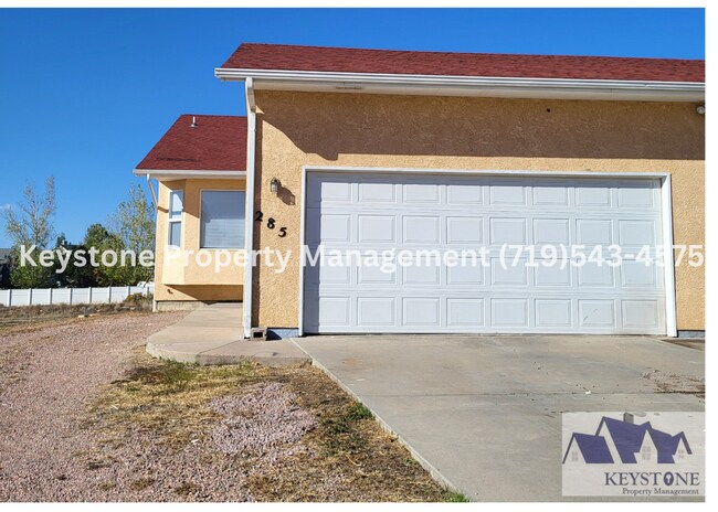 Building Photo - Spacious Pueblo West Duplex 3 Bed/3 Bathroom Unit with 2 Car Garage  $1995/$1995