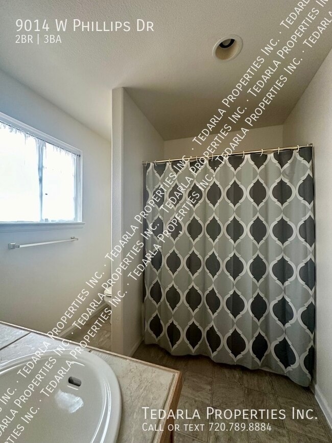 Building Photo - 9014 W Phillips Dr