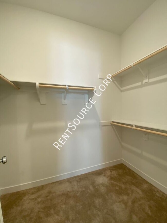 Building Photo - 3 Bedroom, 2022 New Construction Flat w/ S...