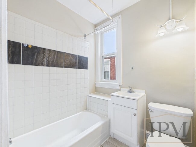 Building Photo - Available Now! Spacious 5 Bedroom Home Loc...