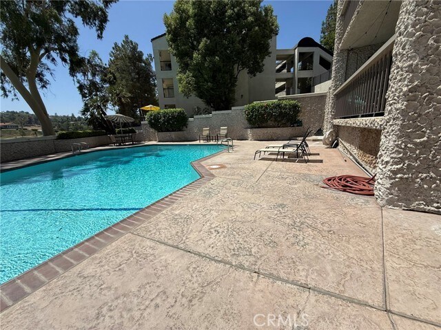 Building Photo - 5555 Canyon Crest Dr
