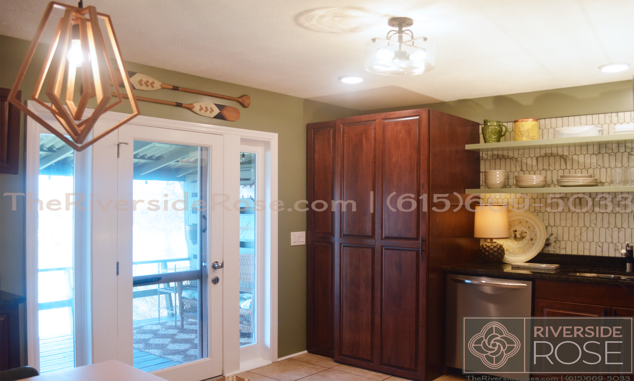 The view from the kitchen makes you feel like you're floating above the river. - 3726 Moss Rose Dr