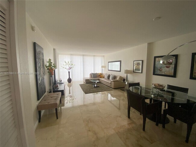 Building Photo - 10275 Collins Ave