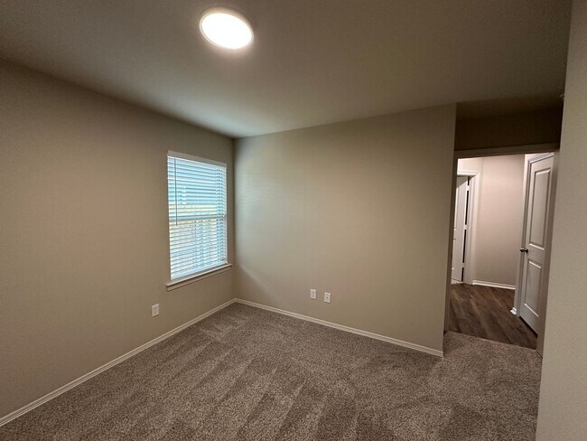 Building Photo - Bryan - 3 bedroom - 2 bath - 2 car garage - fenced in back yard - Brand New House - very new to B...