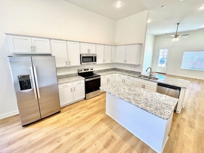 Building Photo - Now Leasing a Brand New 5-Bedroom 3 Bath H...