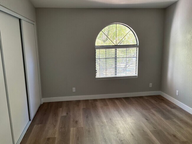 Building Photo - Condo 3 bedrooms 2 bathrooms 1 car garage gated subdivision.