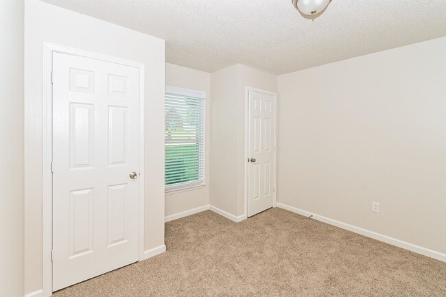 Building Photo - 7360 Red River Cove