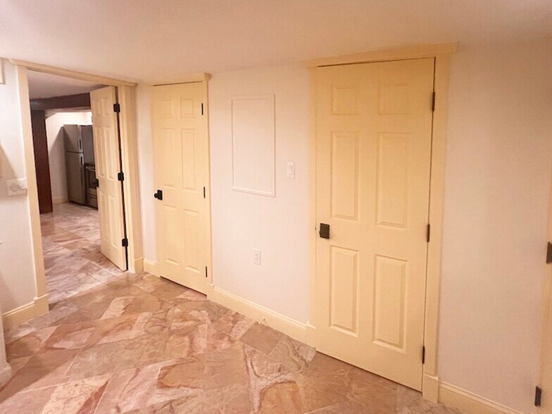 bedroom bathroom and closet doors, closed - 1878 Monroe St NW