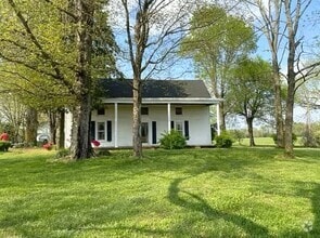 Building Photo - Classic country style house available now!