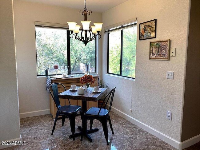 Building Photo - 9555 E Raintree Dr